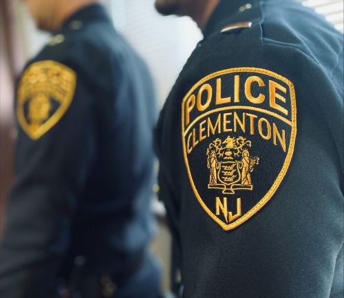 2 officers wearing uniforms